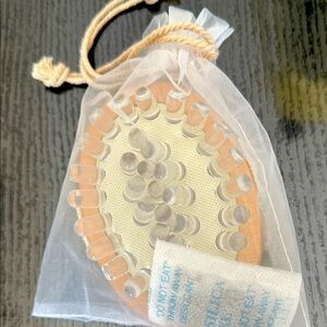 L’occitaine scalp brush and massager.  NWT.  Fair offers welcome